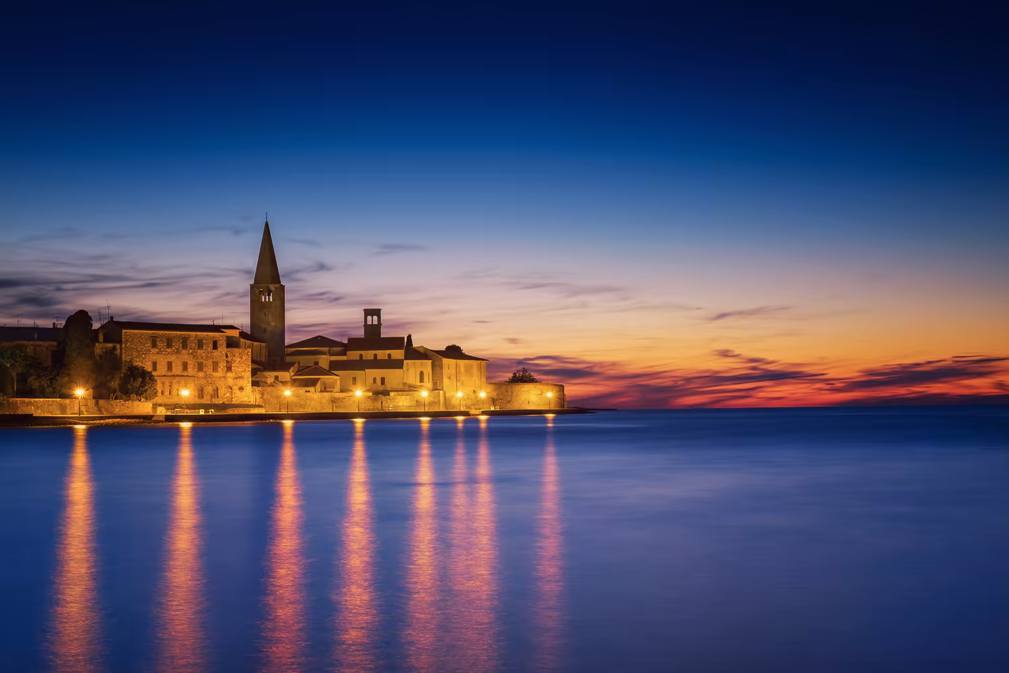 Poreč Old Town at sunset from the sea